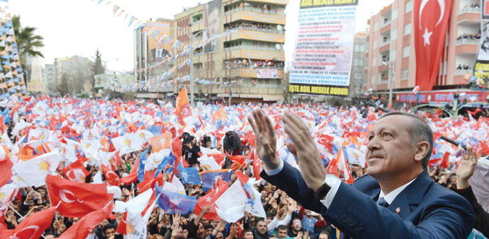 A handout photo released by the Prime Ministeru2019s Press Office shows Erdogan gesturing yesterday as he addresses a rally of his AK Party in Adiyaman, s