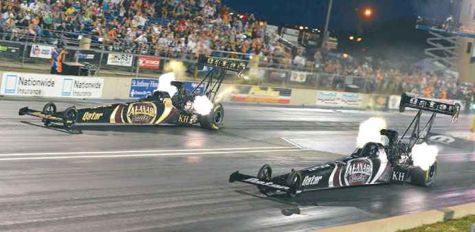 Al-Anabi Racing drivers Khalid al-Balooshi (left) and Shawn Langdon race in the second round of qualifying near Denver.