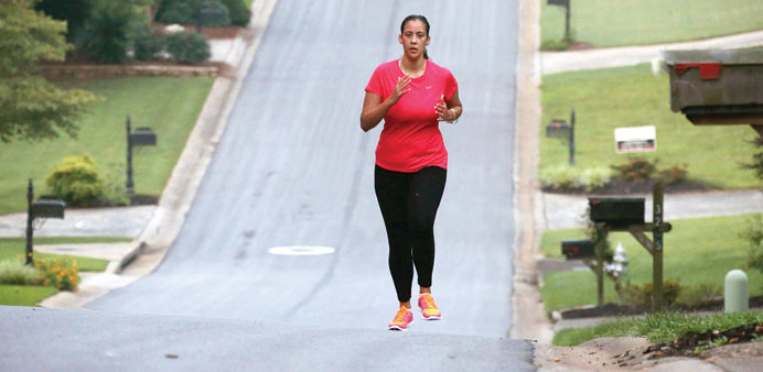 RUNNING AGAIN: Bianca Cooper runs in Marietta neighbourhood, something she used to enjoy a lot in her Marietta subdivision before her stroke last year