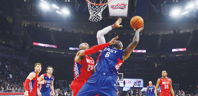 NBA All-Star Kobe Bryant of the Los Angeles Lakers defends against  All-Star LeBron James of the Miami Heat during the 2013 NBA All-Star basketball ga