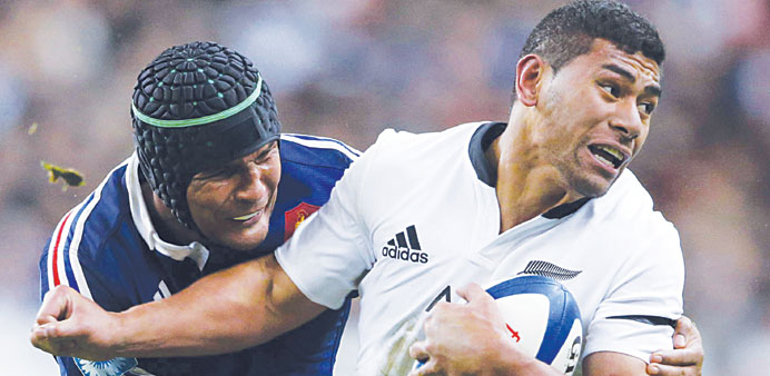 Franceu2019s Thierry Dusautoir (left) tackles New Zealand All Blacksu2019 Charles Piutau during their Rugby Test match at the Stade de France in Saint-Denis n