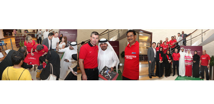 Denis Irwin during the visit to the branch at The Pearl-Qatar (Porto Arabia).