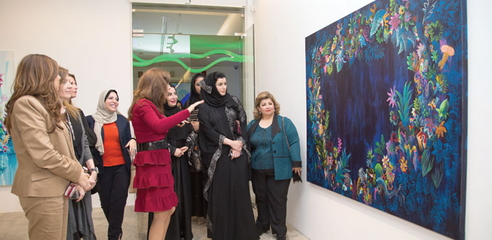 Aisha Alfardan and her colleagues from QBWA touring Anima Gallery.