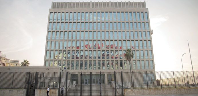 Cubans flags are reflected at the US embassy in Havana. 