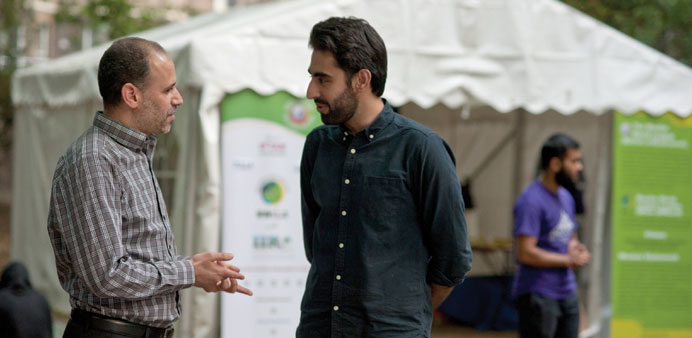 Ayyoub Abouliaqin with Omar Salha at the Ramadan Tent Project Iftar. PICTURES: Rooful Ali