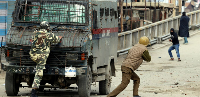 Indian police clash with Kashmiri protestors during a protest in Baramullah, north of Srinagar
