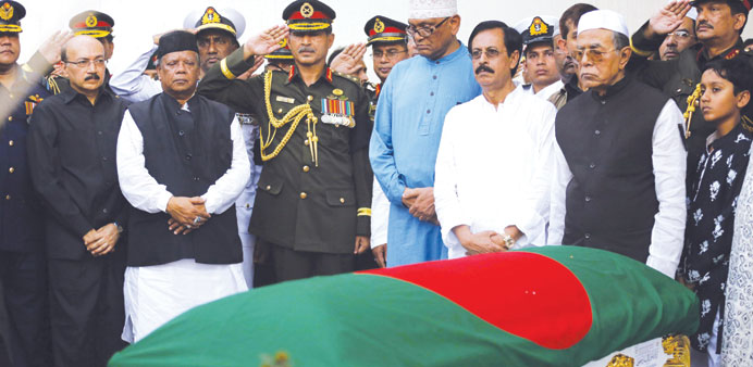 Acting President and speaker of parliament Abdul Hamid, second right, pays tribute to Bangladeshu2019s late president Zillur Rahman during Rahmanu2019s funera