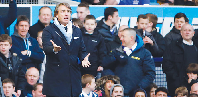 Manchester Cityu2019s manager Roberto Mancini has said that unlike last year, this season his side has definitely lost the trophy.