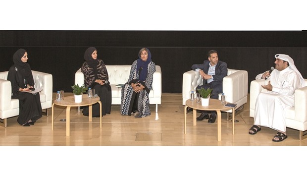 Participants in a panel discussion.