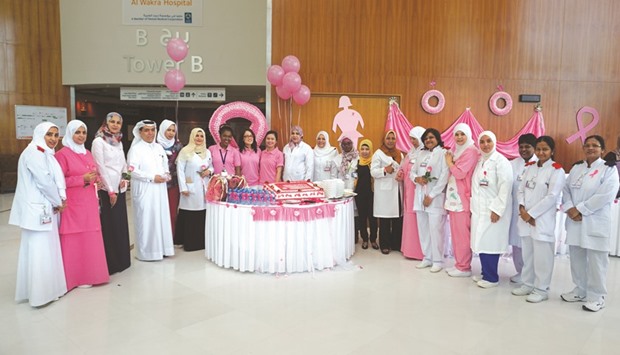 Participants attend a breast cancer awareness campaign event at the Al Wakra Hospital.