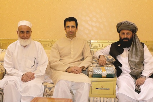 Ambassador of Pakistan Shahzad Ahmad, centre, with Maulana Qayamuddin, left, and Saleh Mohammed at the reception.       Photo by Umer Nangiana