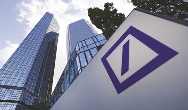 The headquarters of Deutsche Bank is seen in Frankfurt. The bank has slid from the top position to No 7 on mergers and acquisitions involving German firms and to No 9 on European deals this year from sixth place in 2015, according to data compiled by Bloomberg.