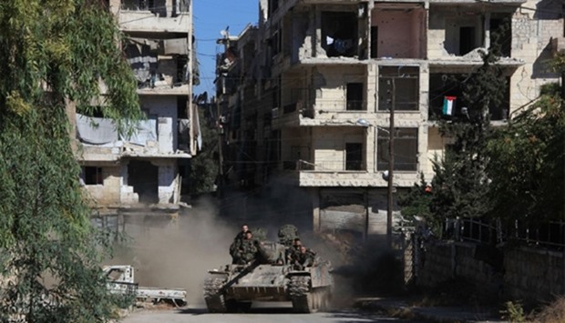 Syrian pro-government forces take part in an operation to take control of Aleppo