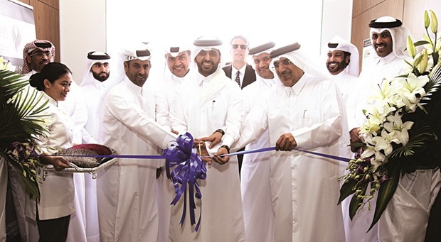 QDB chief executive officer Abdulaziz bin Nasser al-Khalifa and other dignitaries lead the ribbon-cutting ceremony of the u2018One Stop Shopu2019 multi-service support centre at the Qatar Business Incubation Centre.
