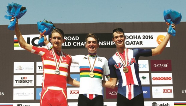 Brandon McNulty of the United States (centre) beat Denmarku2019s Mikkel Bjerg (left) and Ian Garrison, also of the United States, for victory in the menu2019s junior individual time trial event at the UCI Road World Championships Doha 2016 yesterday.