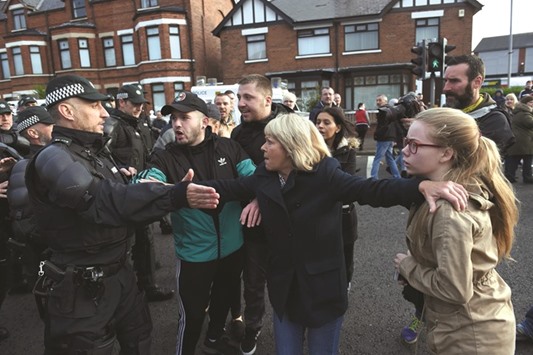 People clash with police in Ardoyne.
