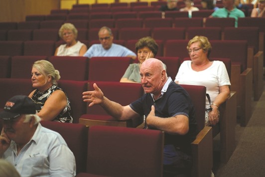 A British resident living in Spain asks questions during an informative Brexit talk by the u201cBrexpats in Spainu201d group, about Spanish legal issues to become Spanish citizens, at the town hall in La Cala de Mijas, southern Spain, recently.