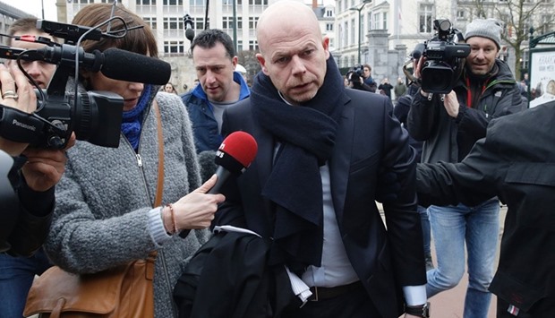 Sven Mary (C), lawyer of key suspect in the Paris terror attacks Salah Abdeslam, arriving at the Council Chamber of Brussels during investigations into the Paris and Brussels terror attacks, on March 24, 2016.