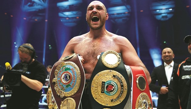 British boxer Tyson Fury has admitted taking cocaine to deal with depression and has vacated his WBO and WBA titles to concentrate on his medical treatment. (Reuters)