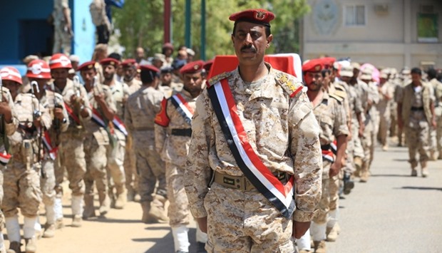 Soldiers carry the coffin of Major-General Abdulrab al-Shadady during his funeral in Marib city, Yemen on October 9, 2016