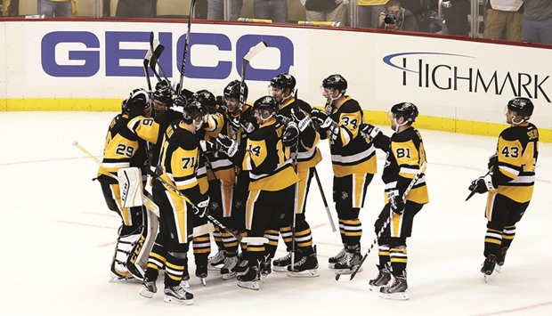 Pittsburgh Penguins players celebrate their win over the Washington Capitals in Pittsburgh, Pennsylvania, on Thursday. (AFP)