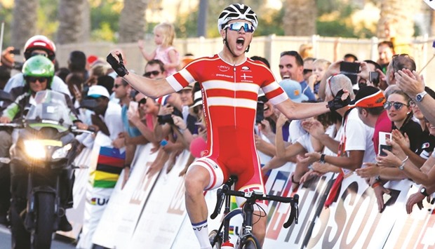 Denmarku2019s Jakob Elgholm celebrates as he crosses the finish line to win the menu2019s junior Road Race. PICTURES: Jayaram