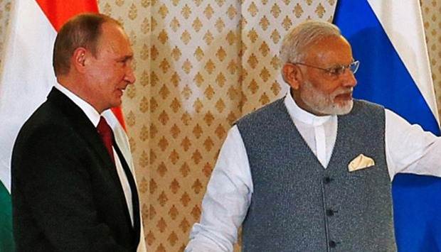 India's Prime Minister Narendra Modi with Russian President Vladimir Putin