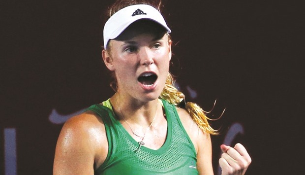 Wozniacki reacts after winning a point against Jelena Jankovic during their Hong Kong Open semi-final yesterday. (Reuters)