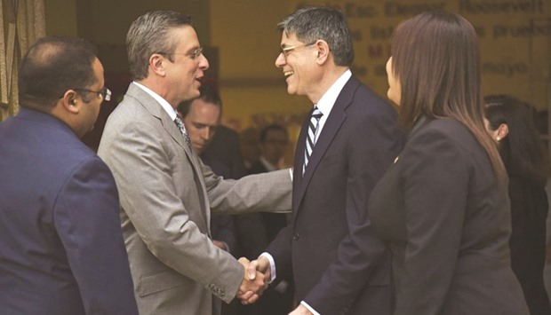 Treasury secretary Jacob Lew with Puerto Ricou2019s Governor Alejandro Garcia Padilla.
