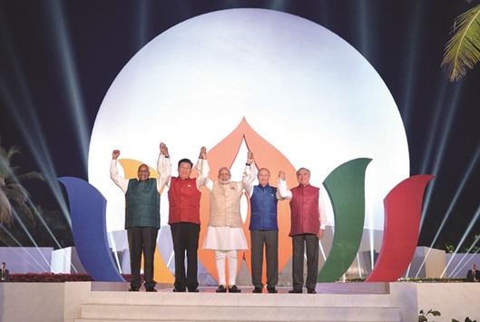 From left: South African President Jacob Zuma, Chinese President Xi Jinping, Indian Prime Minister Narendra Modi, Russian President Vladimir Putin and Brazilian President Michel Temer pose during the Brics summit in Goa. Xi said yesterday a rising tide of protectionism and anti-globalisation was endangering the world economyu2019s still fragile recovery.