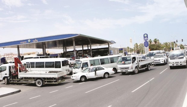 A long queue of vehicles at a petrol station in Doha