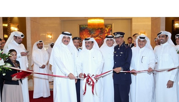 HE the Minister of Transport and Communications Jassim Seif Ahmed al-Sulaiti inaugurating the Qatar Transport Safety Forum as HE the Minister of Municipality and Environment Mohamed bin Abdullah al-Rumaihi, Director General of Public Security HE Staff Major General Saad bin Jassim al-Khulaifi and other officials look on.