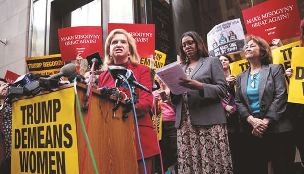 Representative Carolyn Maloney (D-NY) speaks during a protest against Republican presidential candidate Donald Trump for his u2018treatment of womenu2019 in front of Trump Tower in New York City.