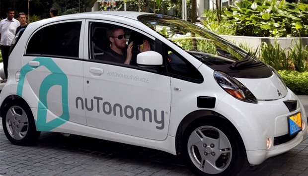 driverless car navigates a road in Singapore