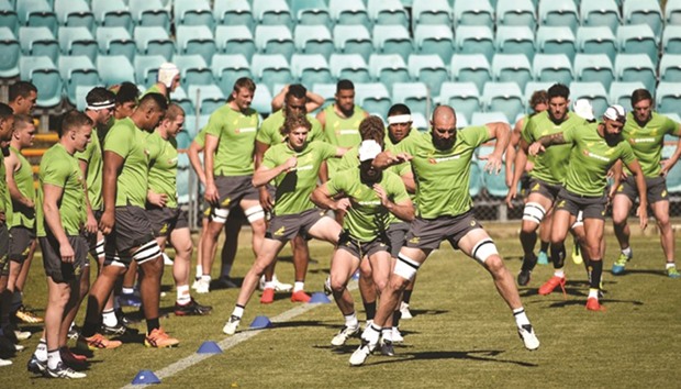 Australian rugby players take part in a training session in Sydney yesterday, ahead of the Wallabies' clash against the New Zealand All Blacks in Auckland on Saturday. (AFP)