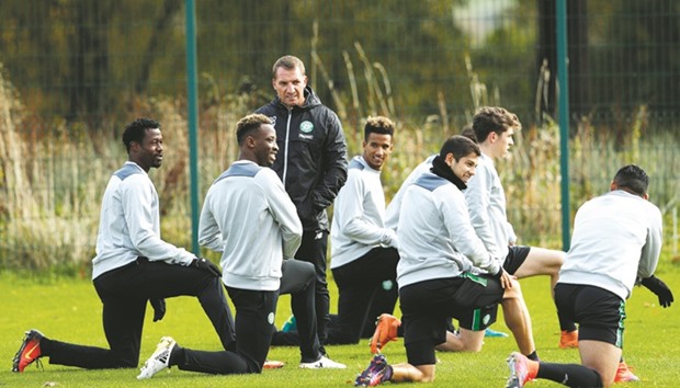 Celtic manager Brendan Rodgers keeps an eye on his players during training. (Reuters)