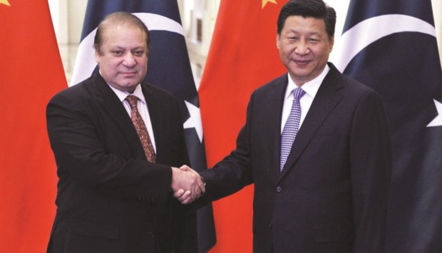 TWO TO TANGO: Prime Minister Nawaz Sharif, left, with Chinese President Xi Jinping in Islamabad.