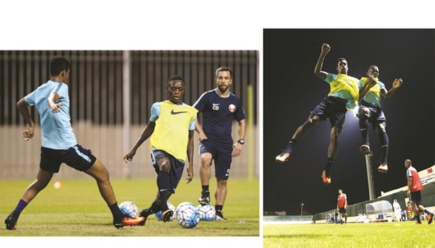 Qataru2019s Abdulrasheed Umaru (centre) takes part in a training session yesterday. PICTURES: Fadi al-Assaad
