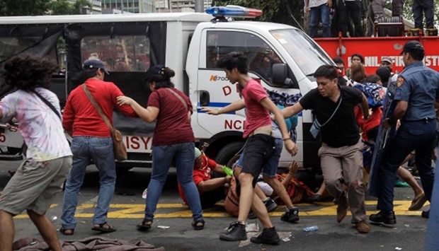 Philippine police van rams into anti-US protesters