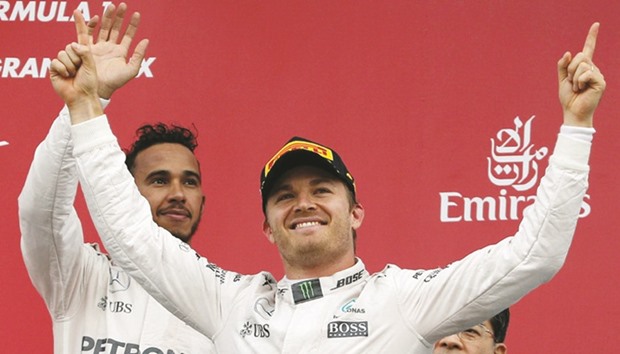 Mercedesu2019 drivers Nico Rosberg (foreground) is 33 points ahead of teammate Lewis Hamilton (left) in the championship standings. (Reuters)