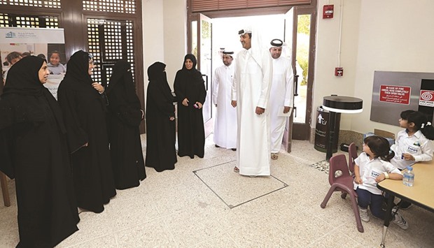 HH the Emir Sheikh Tamim bin Hamad al-Thani is greeted by the staff of the College of Education and Early Childhood centre.