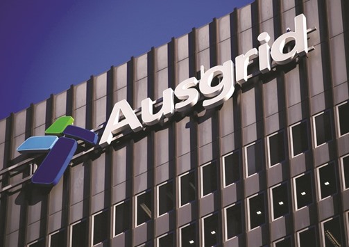 The logo for Australiau2019s biggest electricity network Ausgrid adorns its headquarters building in central Sydney. The electricity grid has been sold to local pension funds for $12.5bn, a deal sources say consists largely of debt and is much cheaper than bids from China and Hong Kong that were blocked on security concerns.
