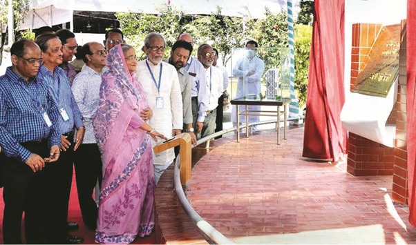 Prime Minister Sheikh Hasina laying the foundation of the 31-storey u2018Bangabandhu Media Complexu2019 at the National Press Club in Dhaka yesterday, marking its 62nd founding anniversary.