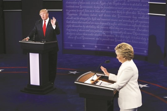 Clinton and Trump speak during the final presidential debate at the Thomas & Mack Centre on the campus of the University of Las Vegas in Las Vegas.