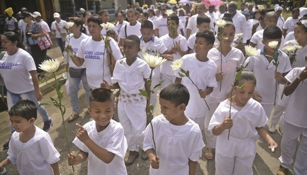 Colombian children take part in a Farc-organised u2018act of atonementu2019 in Apartado, Antioquia department.