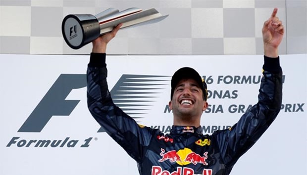 Red Bull\'s Daniel Ricciardo of Australia celebrates on the podium.