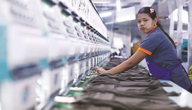 A labourer works at a garment factory in Bangkok. The Bank of Thailand has forecast the Southeast Asiau2019s second-largest economy will grow 3.2% this year.