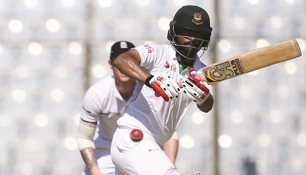 Bangladeshu2019s Tamim Iqbal plays a shot on Day Two of the first Test against England in Chittagong yesterday. (AFP)
