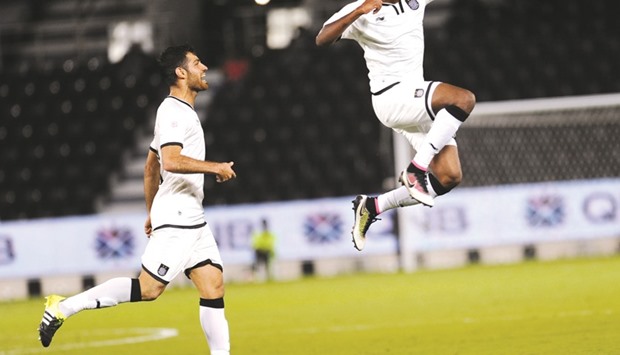 Al Saddu2019s Abdelkarim Hassan (right) celebrates after scoring against Muaither yesterday. PIC: Shemeer Rasheed