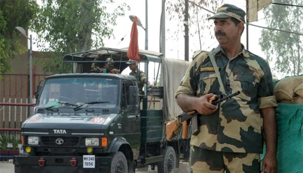 Border Security Force personnel stand guard at Wagah, some 35km from Amritsar.